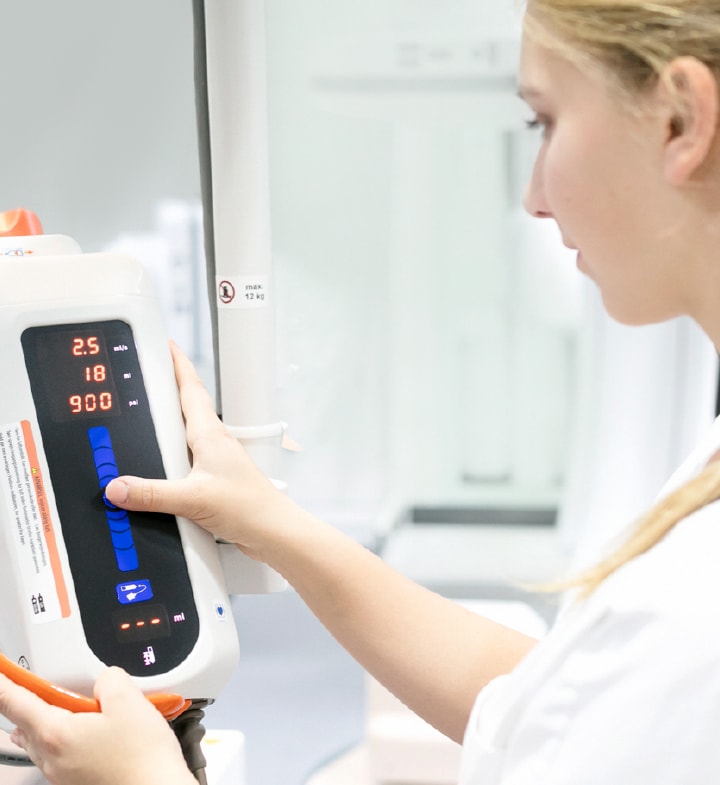 Woman using Medrad<sup>®</sup> Mark 7 Arterion Injector